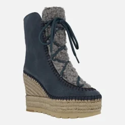 Botas de ante estilo esquimal con pala de borreguillo y cuña alta de yute