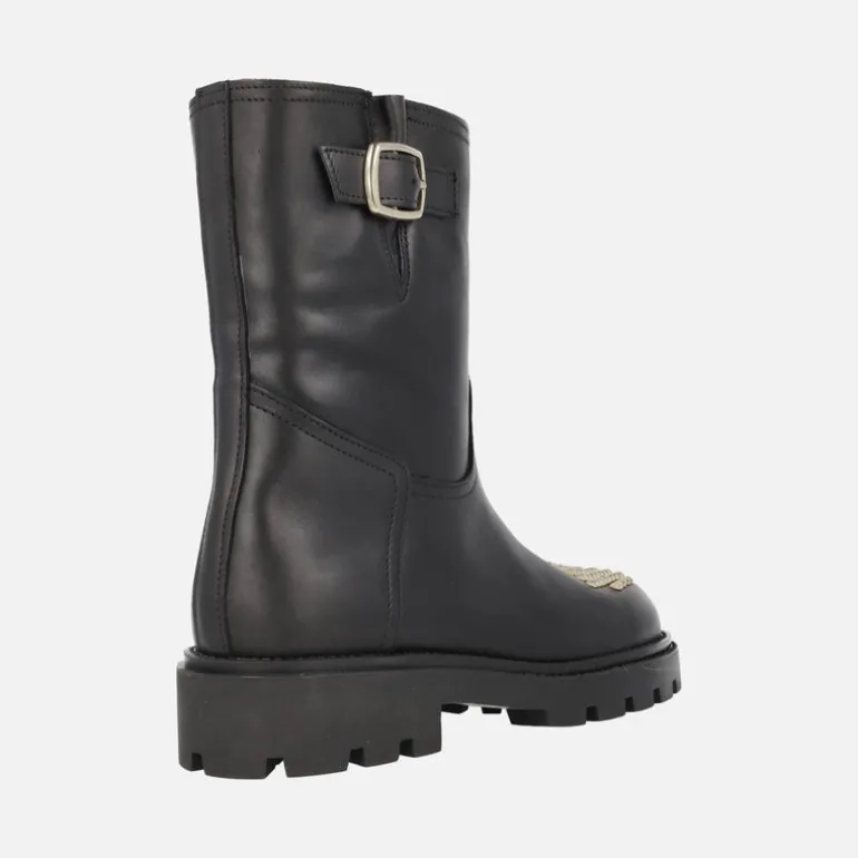 Botas negras de piel Agnes con tachas doradas en la puntera