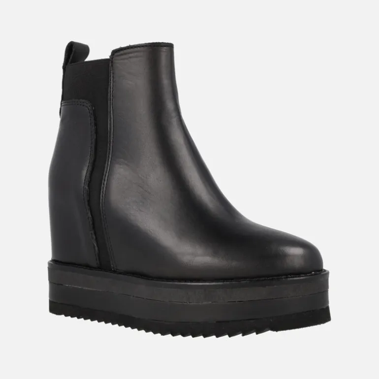 Botines Alpe Vanity en piel negra con cuña interior
