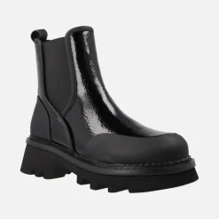 Botines chelsea en charol negro con piso track Ring
