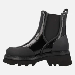 Botines chelsea en charol negro con piso track Ring