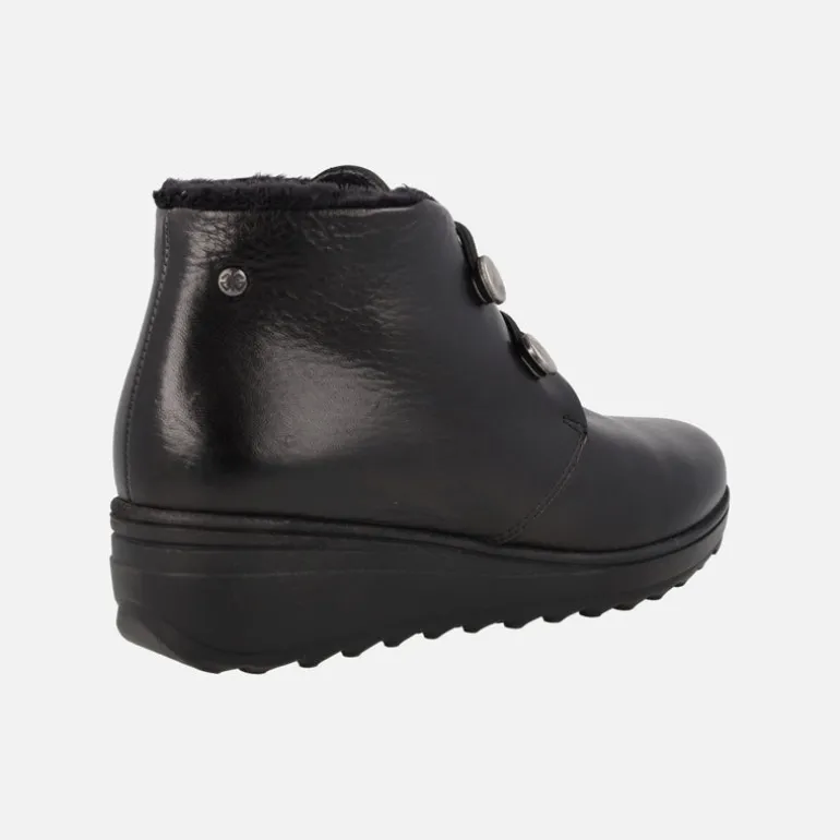 Botines de piel con elásticos y forro de pelo