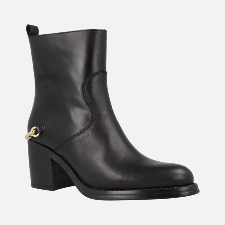 Botines de tacón en piel negra Leyna con adorno dorado en el talón