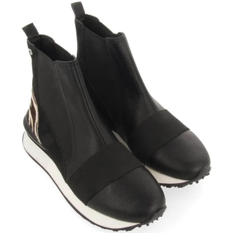 Botines negros chelsea con trasera de cebra Harbin