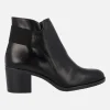Botines negros de piel con tacón y elástico trasero