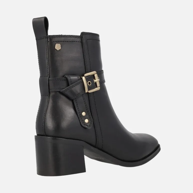 Botines negros de piel con adorno de hebilla y tacón medio