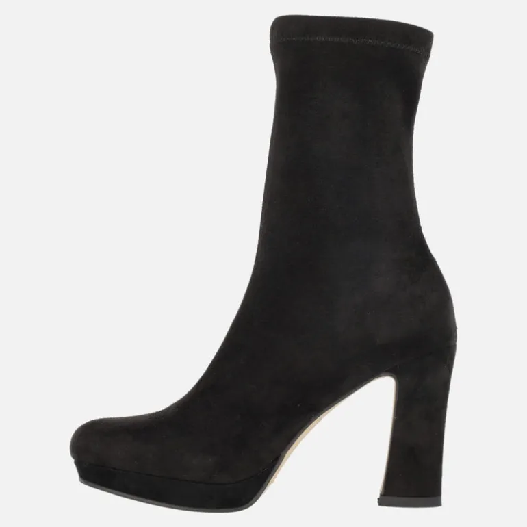 Botines negros de tejido elástico textura ante con tacón alto y plataforma