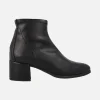 Botines negros elásticos textura piel con tacón bajo