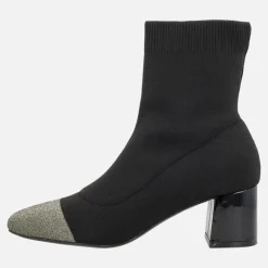 Botines negros estilo calcetín con puntera dorada y tacón Vanlose