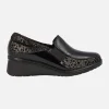 Mocasines confort para mujer en combinado negro y oro