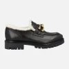 MOCASINES DE piel negra MILITARE CON FORRO BORREGUILLO Y ADORNO METÁLICO
