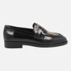 Mocasines negros de charol con tachas doradas en la pala New Mimi