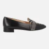 Mocasines negros de piel con copete en print cebra
