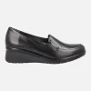 Mocasines negros de piel con elásticos y piso de goma