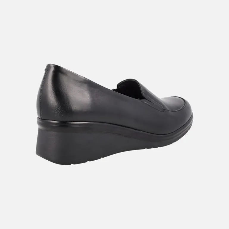 Mocasines negros de piel con elásticos y piso de goma