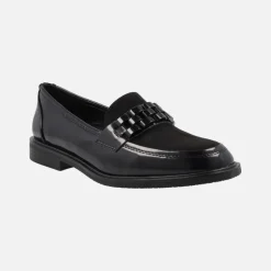 Mocasines negros multimaterial con adorno en la pala