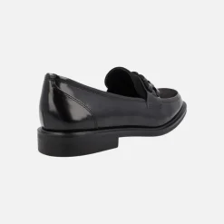 Mocasines negros multimaterial con adorno en la pala