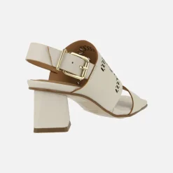 Sandalias Manarola en piel hielo con troquelado y tacones geométricos
