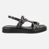 Sandalias negras de piel con tachas metálicas doradas