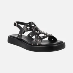 Sandalias negras de piel con tachas metálicas doradas