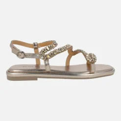 Sandalias planas en metalizado bronce con pedrería