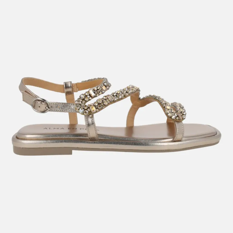 Sandalias planas en metalizado bronce con pedrería