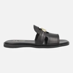 Sandalias planas estilo pala Sheila en piel negra con adorno oro