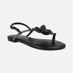 Sandalias planas negras de piel con adorno de flor y strass