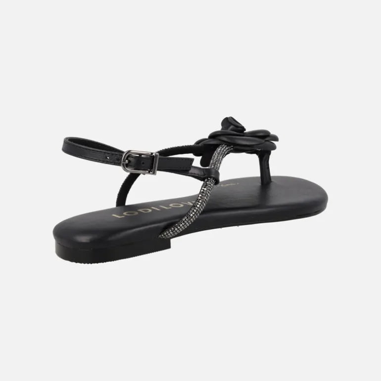 Sandalias planas negras de piel con adorno de flor y strass