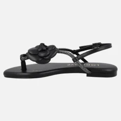 Sandalias planas negras de piel con adorno de flor y strass