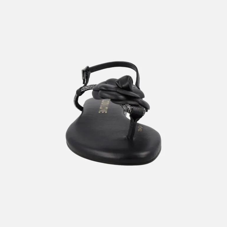 Sandalias planas negras de piel con adorno de flor y strass