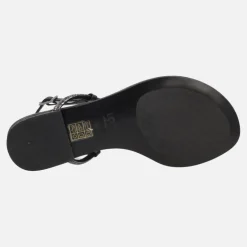 Sandalias planas negras de piel con adorno de flor y strass