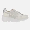 Zapatillas deportivas de piel con dibujos troquelados