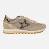 Zapatillas deportivas en combinado champagne con detalles animal print