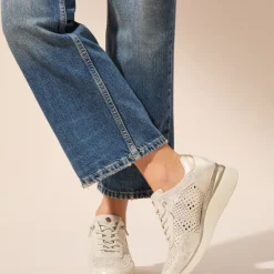 Zapatillas deportivas en piel metalizada oro con cordones elásticos