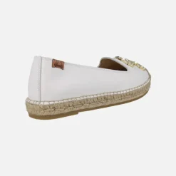 Zapatillas planas de esparto en piel con adorno joya