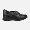 Zapatos confort en combinado negro con elásticos cruzados
