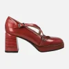 Zapatos corte salón en piel charol con tiras cruzadas y tacón alto