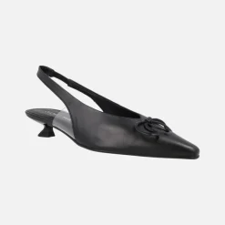 Zapatos de piel destalonados con adorno de lazo