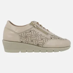Zapatos deportivos de piel con dibujos troquelados