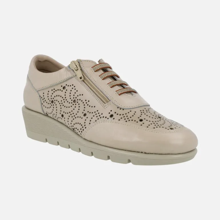 Zapatos deportivos de piel con dibujos troquelados
