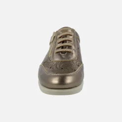 Zapatos deportivos de piel con dibujos troquelados