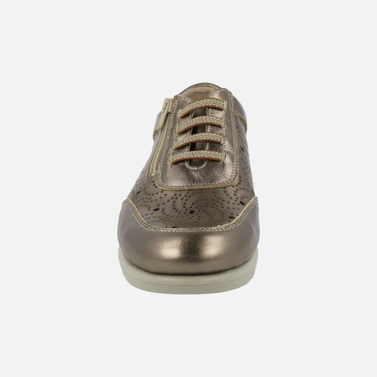 Zapatos deportivos de piel con dibujos troquelados