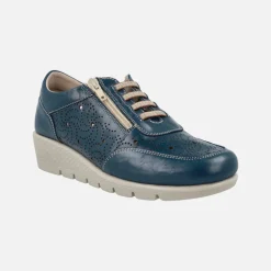 Zapatos deportivos de piel con dibujos troquelados