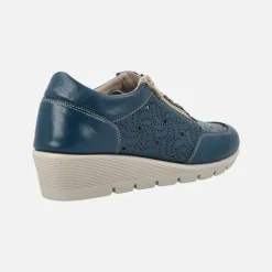 Zapatos deportivos de piel con dibujos troquelados
