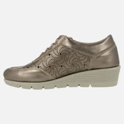Zapatos deportivos de piel con dibujos troquelados