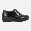 Zapatos deportivos negros de charol con elástico plata