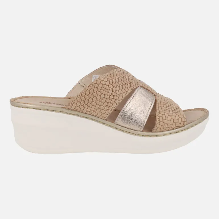 Zuecos de piel en combinado cuero y metal con efecto trenzado