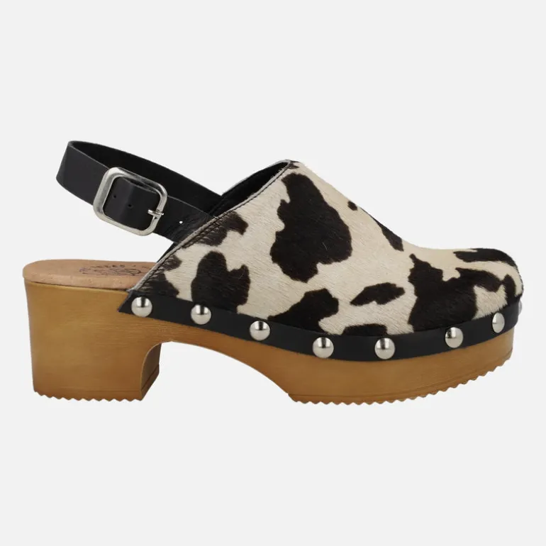 Zuecos en pelo animal print con tira al talón