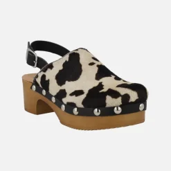 Zuecos en pelo animal print con tira al talón